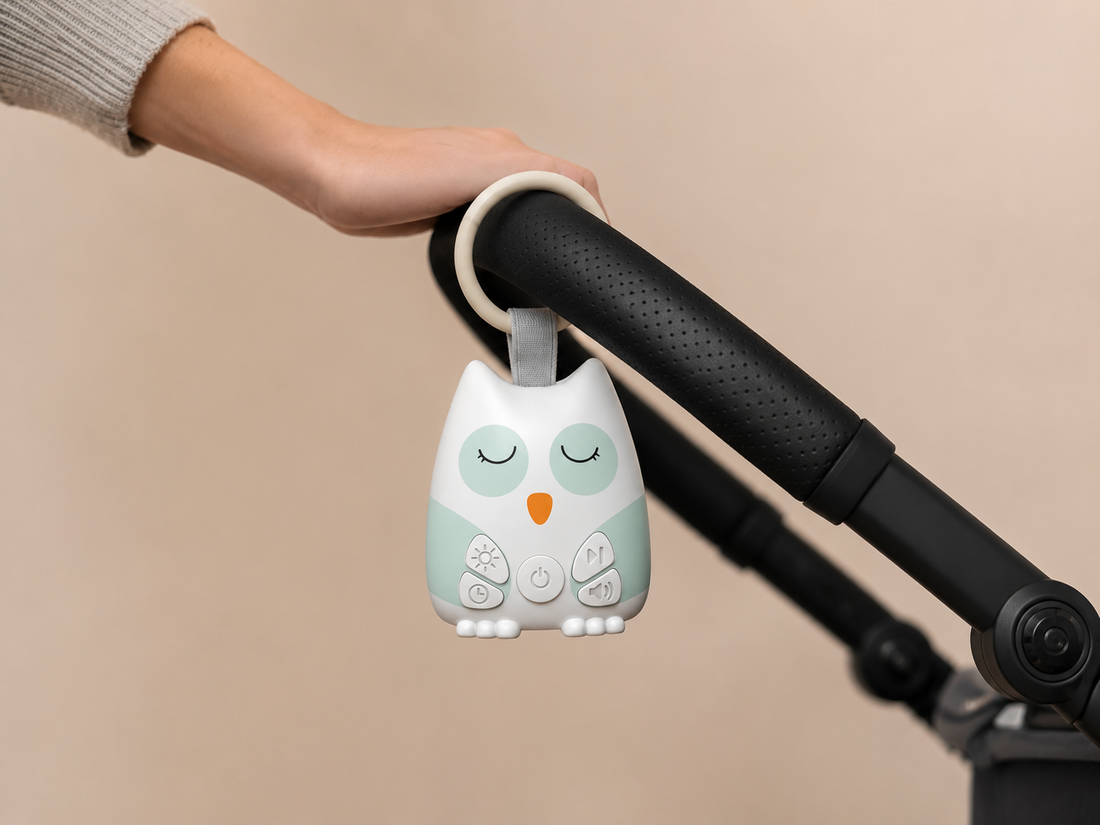 Nouna sleep soother clipped to a stroller